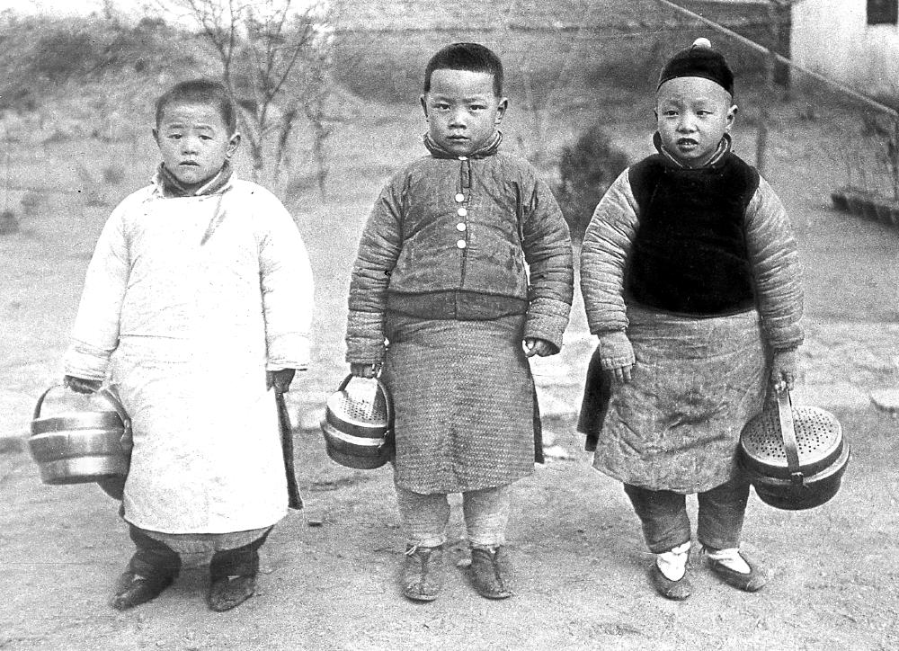 Three Boys in Cold Weather Dress, China, 1928 page 1