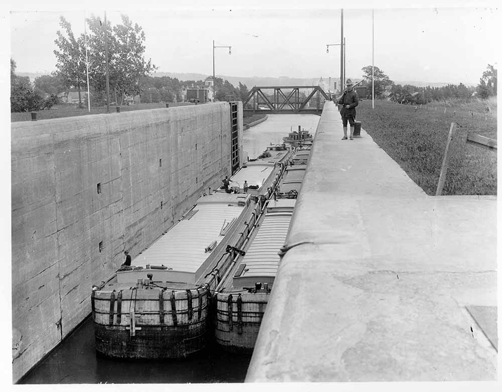 Photograph of Lock 3 at Waterford, guarded by a World War I soldier, 1918 page 1