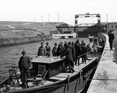 Load Barge Canal - Gov. Whitman and other state officers in Main Document Viewer