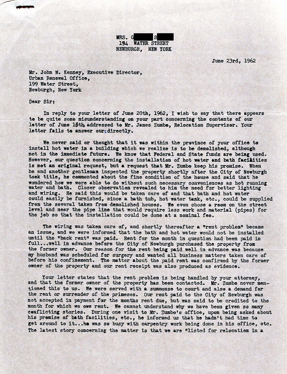 Letter to John M. Kenney, Executive Director of the Newburgh Urban Renewal Office, from a resident expressing dissatisfaction in Mr. Kenney's response regarding absence of hot water page 1