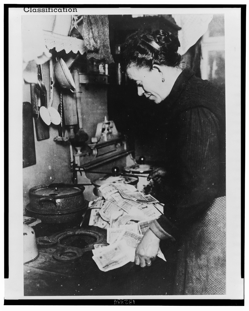 Berlin woman, realizing that fuel costs money, starts the morning fire with marks "not worth the paper they are printed on" page 1