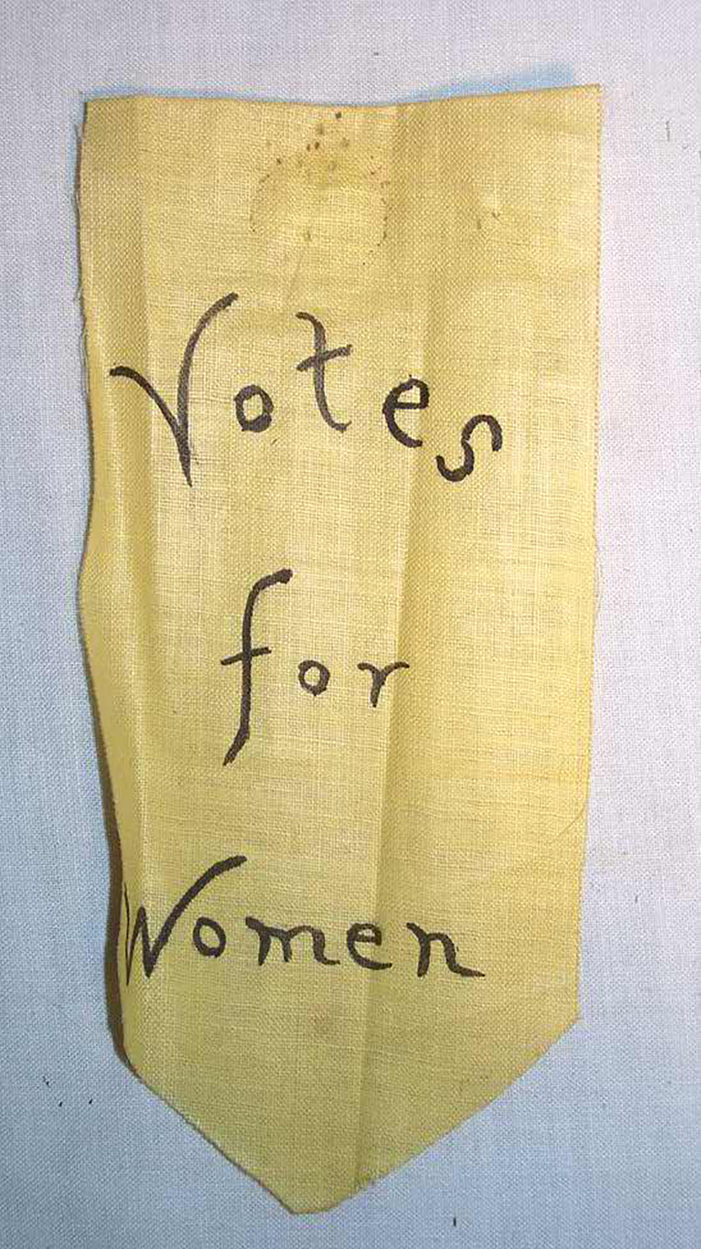 “Votes for Women” badge page 1