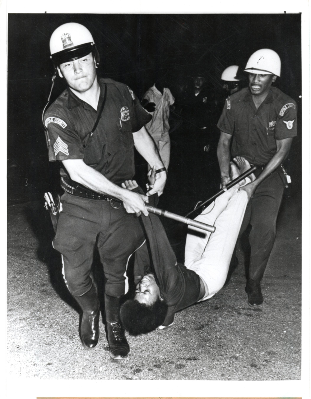 Arrest at a demonstration, North Amityville, NY, by Jacobsen Wolfson/Newsday/Associated Press page 1