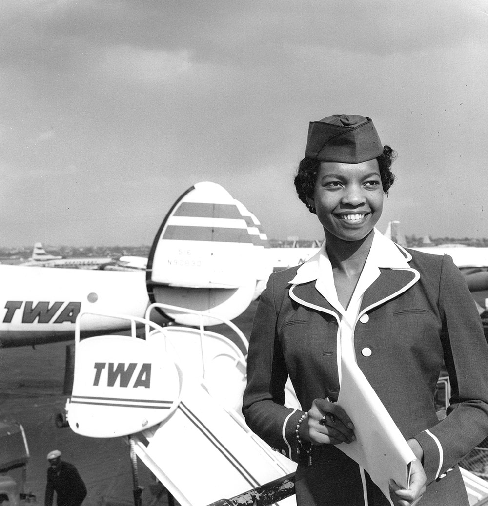 Close Up Photograph of Dorothy Franklin standing by a Trans World Airlines plane at LaGuardia Airport page 1