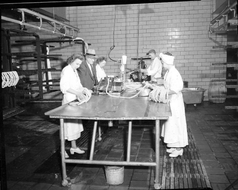 Workers Around Table, c. 1940s page 1