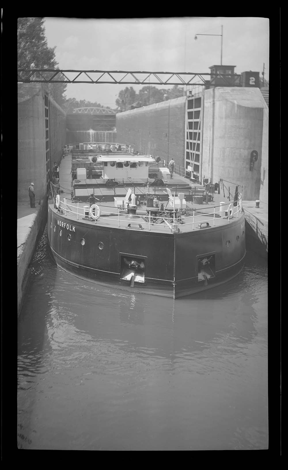 Photograph of the Norfolk, operated by the Ford Motor Company, exiting Lock 2 at Waterford, c. 1939 page 1
