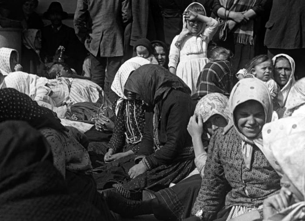 Immigrants on Deck of Steamer, Ellis Island, c. 1925 page 2