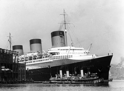 Load S.S. Normandie Being Berthed, New York City, 1937 in Main Document Viewer